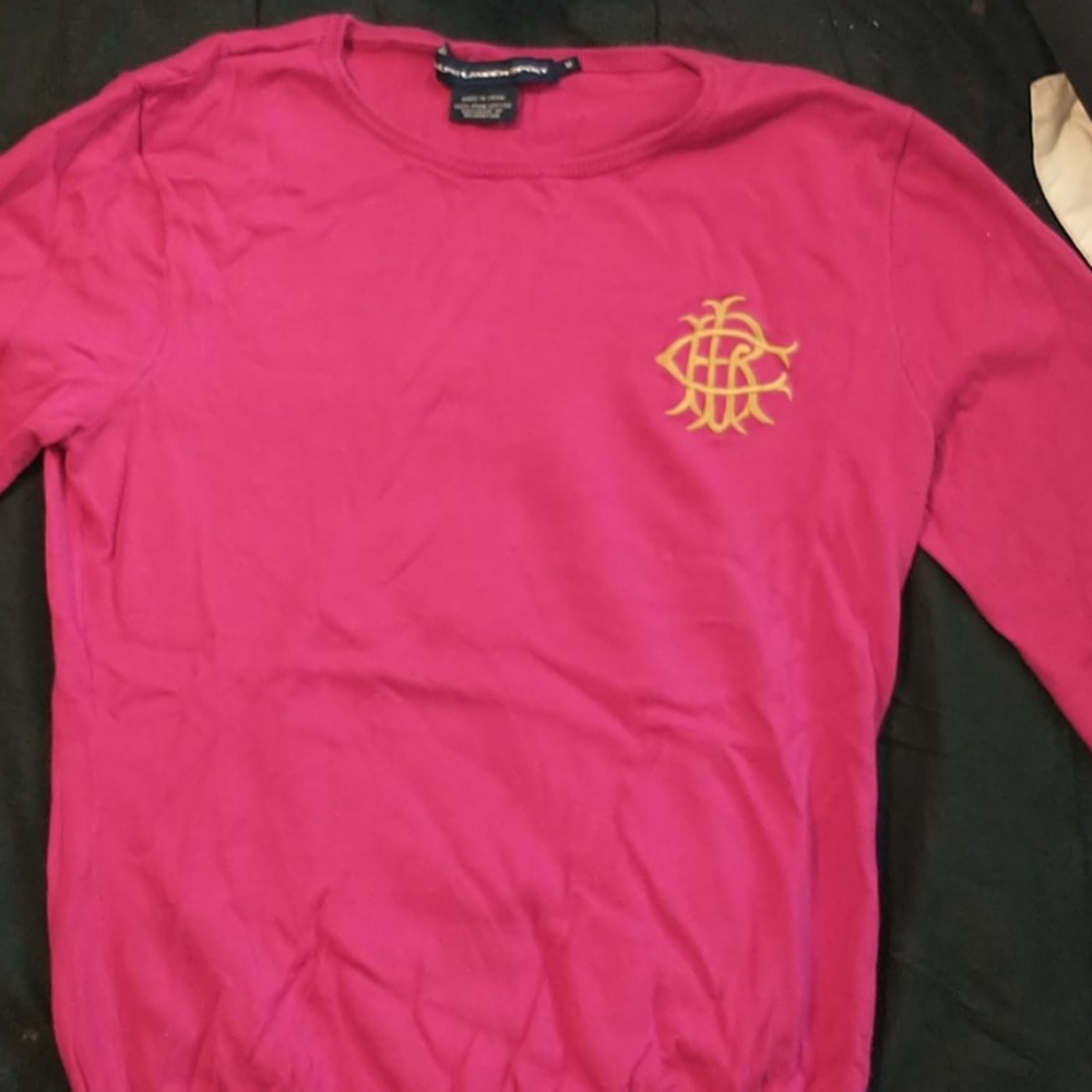 A pink sweater